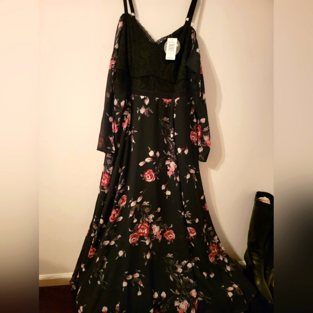 Torrid size 16 black special occasion dress.Sleeves lay off the shoulder.